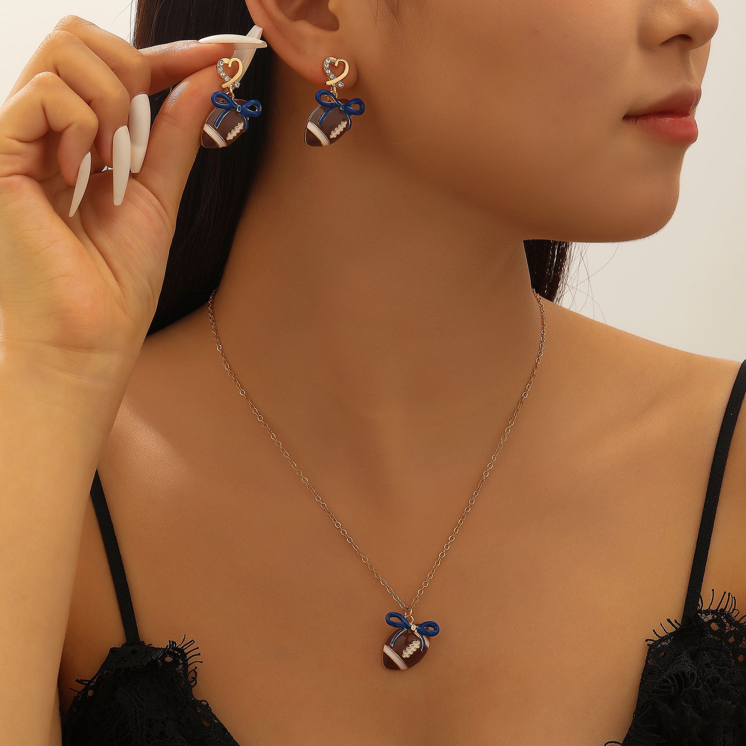 Wholesale sports style football love bow  necklace