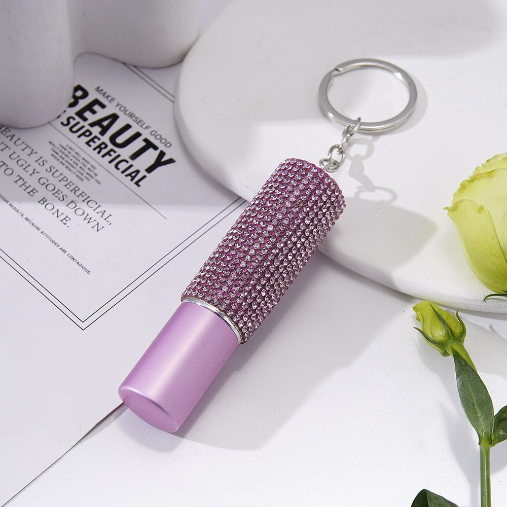 Wholesale mini 5ml rhinestone perfume bottle portable multifunctional plastic keychain ACC-KC-ZhiYa002
