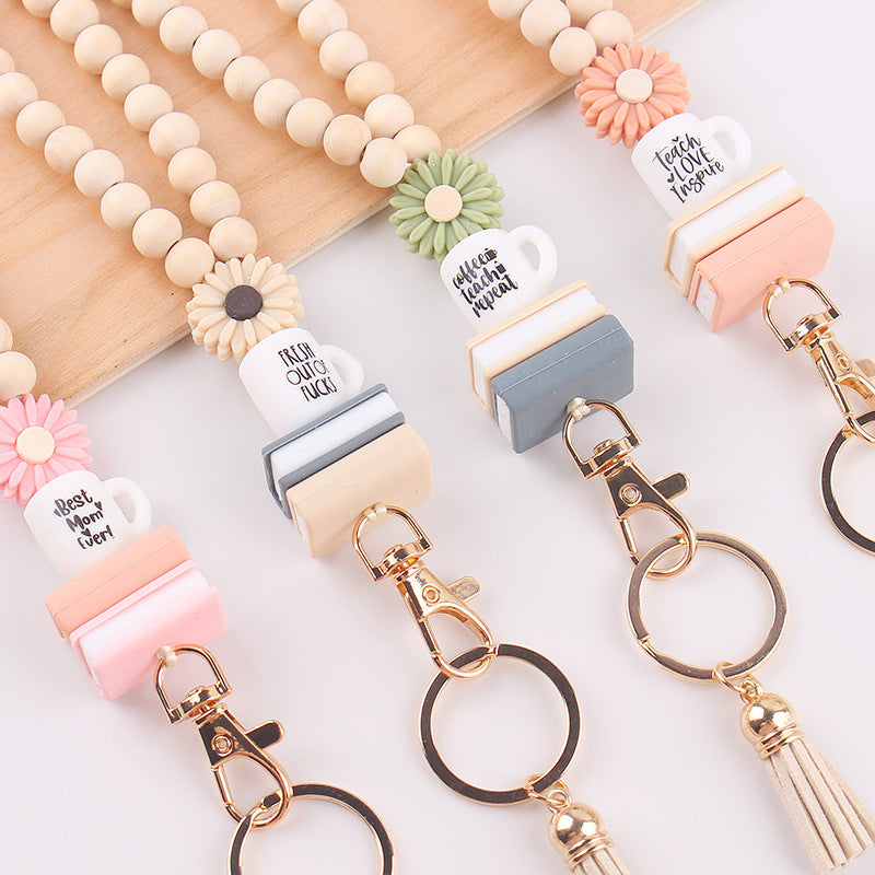 Wholesale Wooden Bead Necklace Keychain Silicone Daisy Book Beaded Tassel Necklace