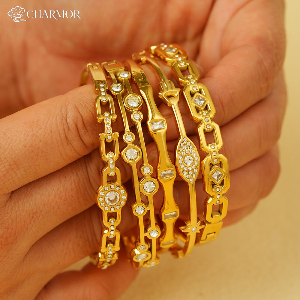 Wholesale Titanium Steel Geometric Starburst Bangle with Inlaid Diamonds