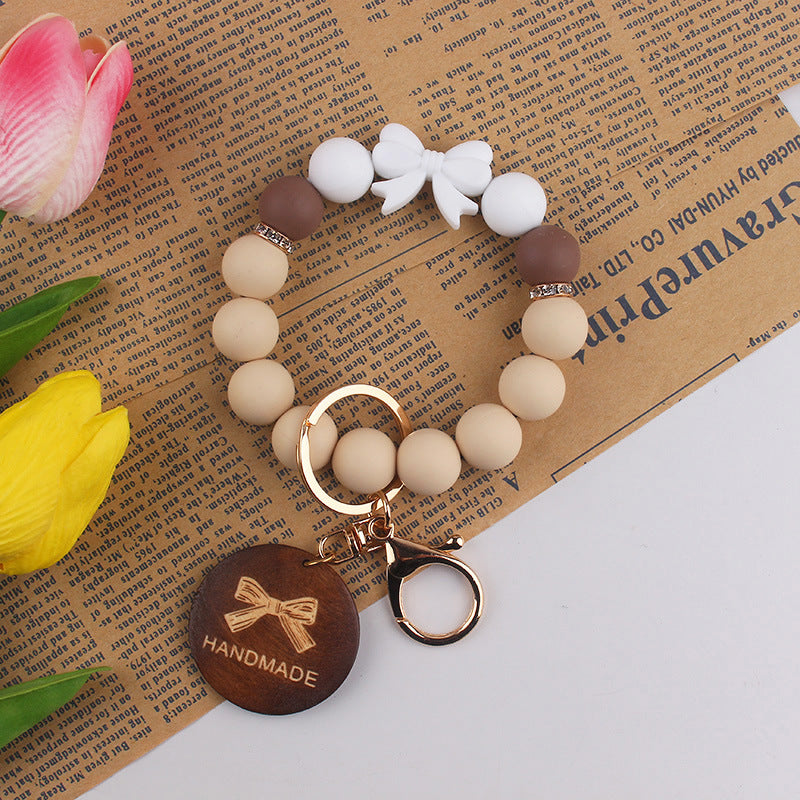 Wholesale Mother' s Day Handmade Gift: Bow-Shaped Silicone Keychain Wristlet