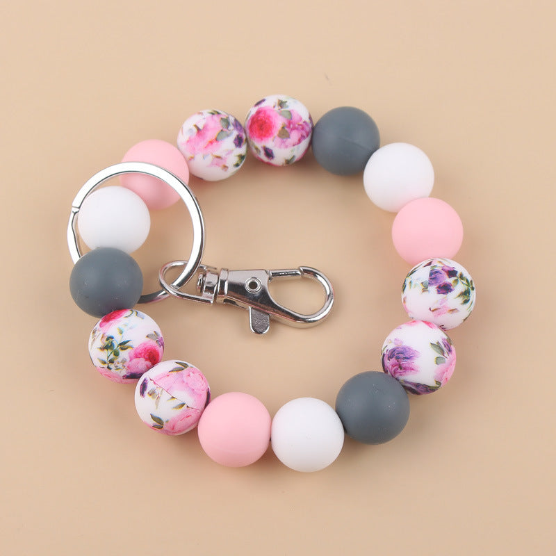 Wholesale Cow Pattern Sunflower Pattern Silicone Beaded Wrist Keychain ACC-KC-GuangTian024
