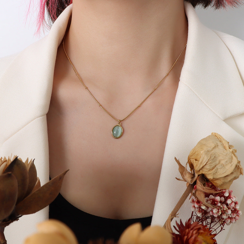 Wholesale French Retro Titanium Steel 18K Gold Plated Cat Eye Oval Pendant Necklace Women S Collarbone Chain Fashion Accessory