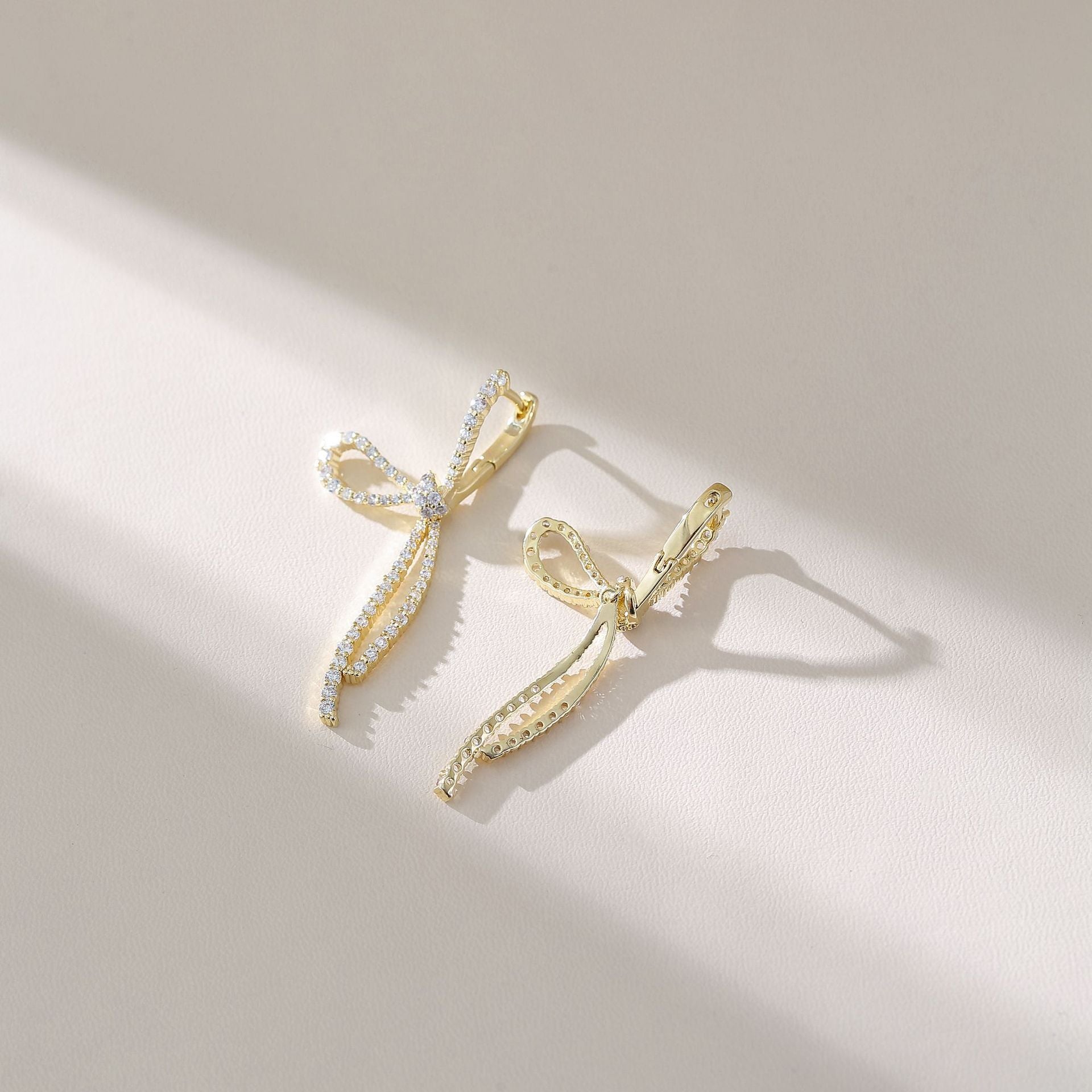 Wholesale Metal Bow Tassel Earrings