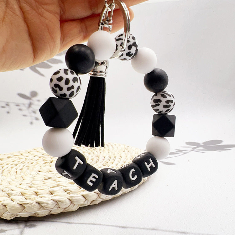 Wholesale Black And White Alphabet Bead Tassel Keychain Bag Charm For Teacher S Day Gift