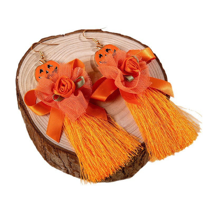 Pendientes retro y coloridos al por mayor Serie de Halloween Pendientes colgantes de borla del cráneo