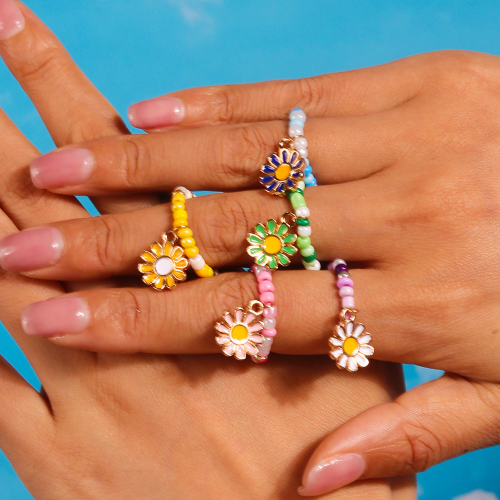 Wholesale flower ring boutique refined small rice bead ring