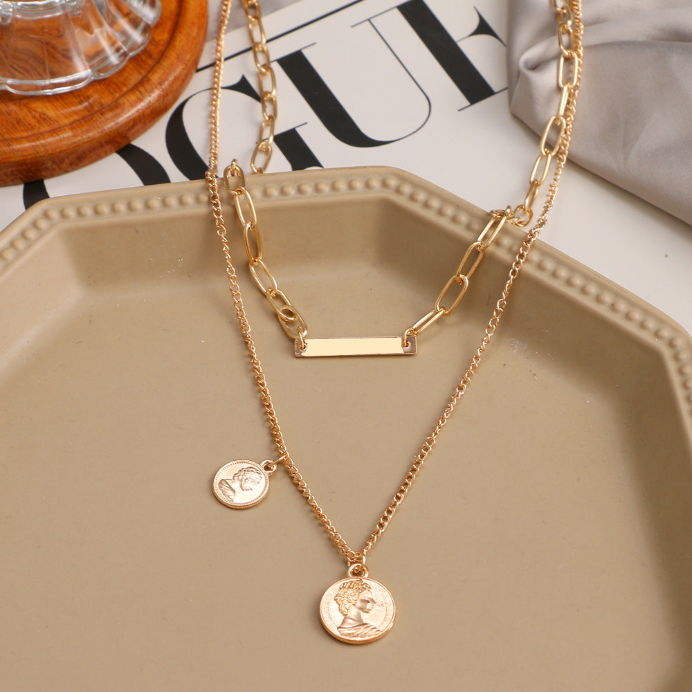 Wholesale Human head necklace set light luxury temperament relief round necklace