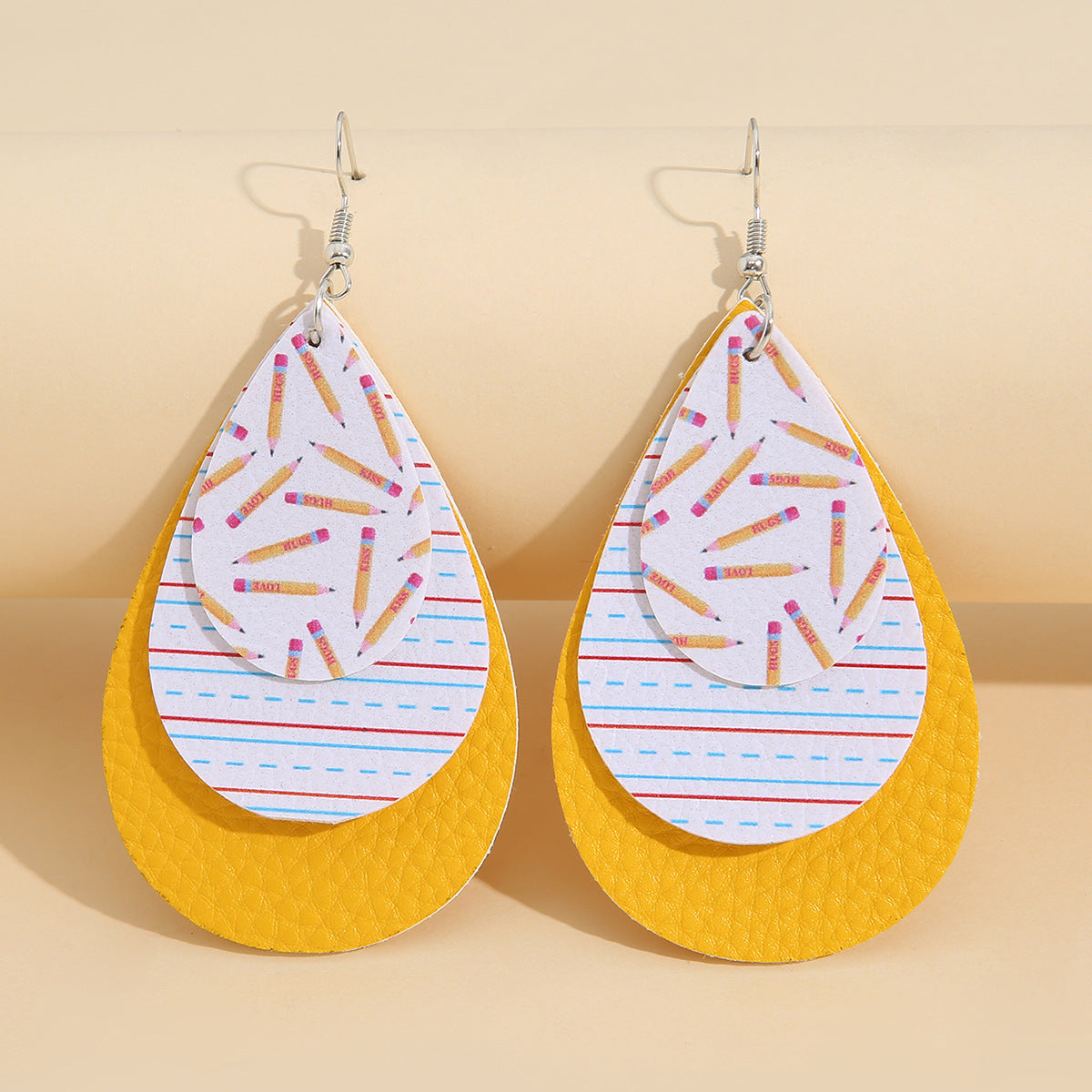Wholesale drop-shaped three-layer graduation season printed leather earrings