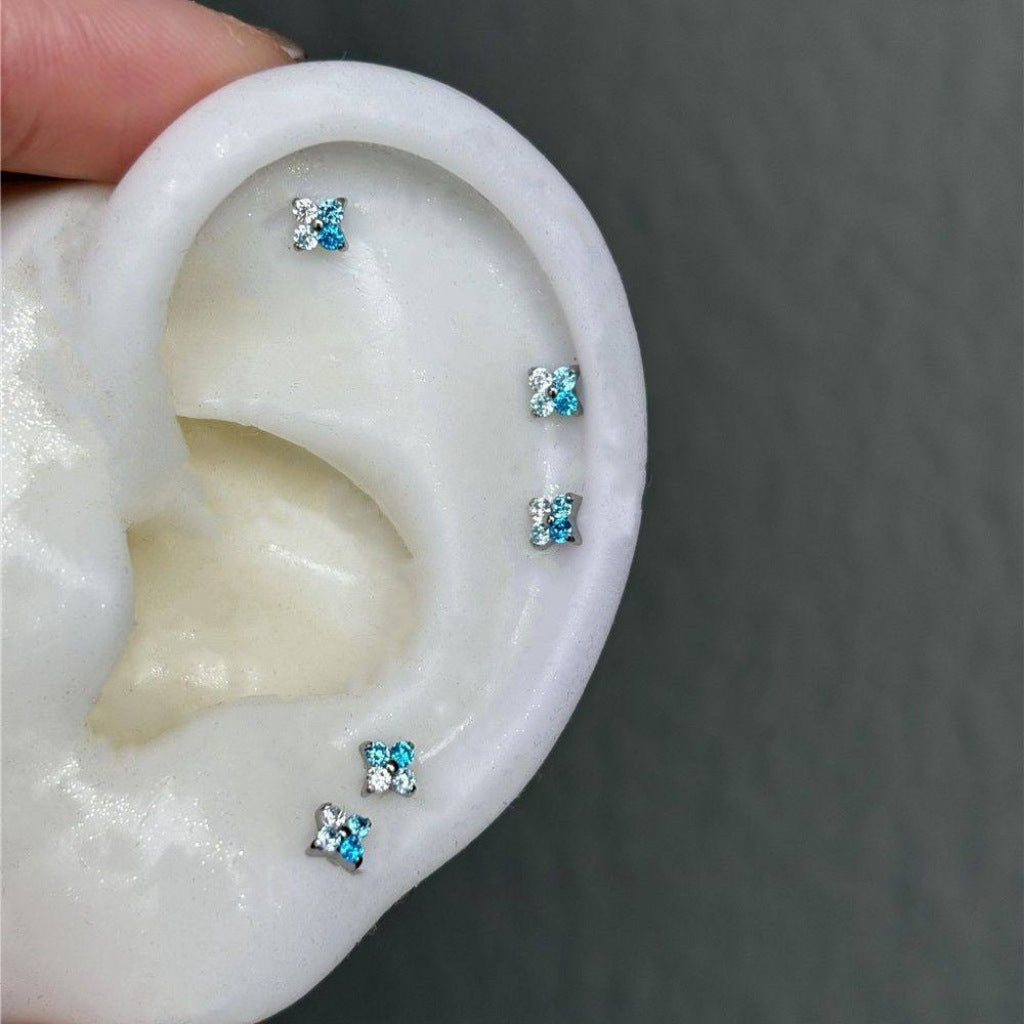 Wholesale Gradient Blue White Zircon Mini Four-leaf Clover Ear Bone Nail Titanium Steel Screw Earring