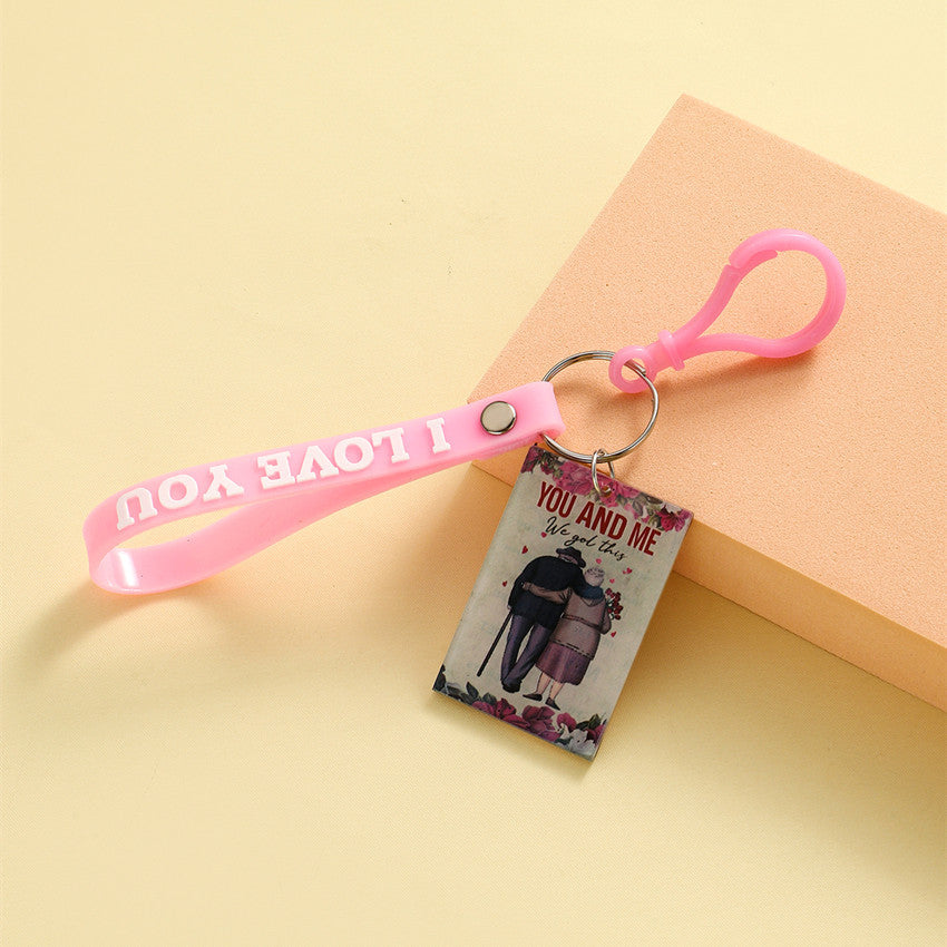 Wholesale English placard couple keychain
