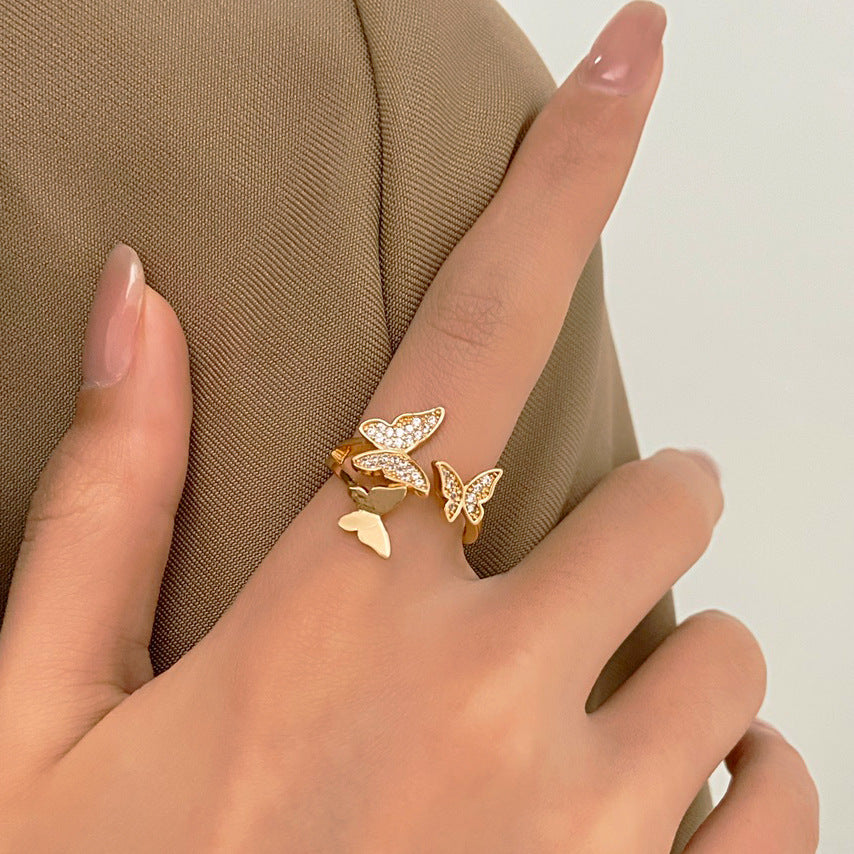 Wholesale Three copper and diamond butterfly rings