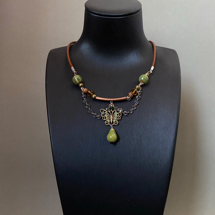 Collana vintage con farfalla verde all'ingrosso
