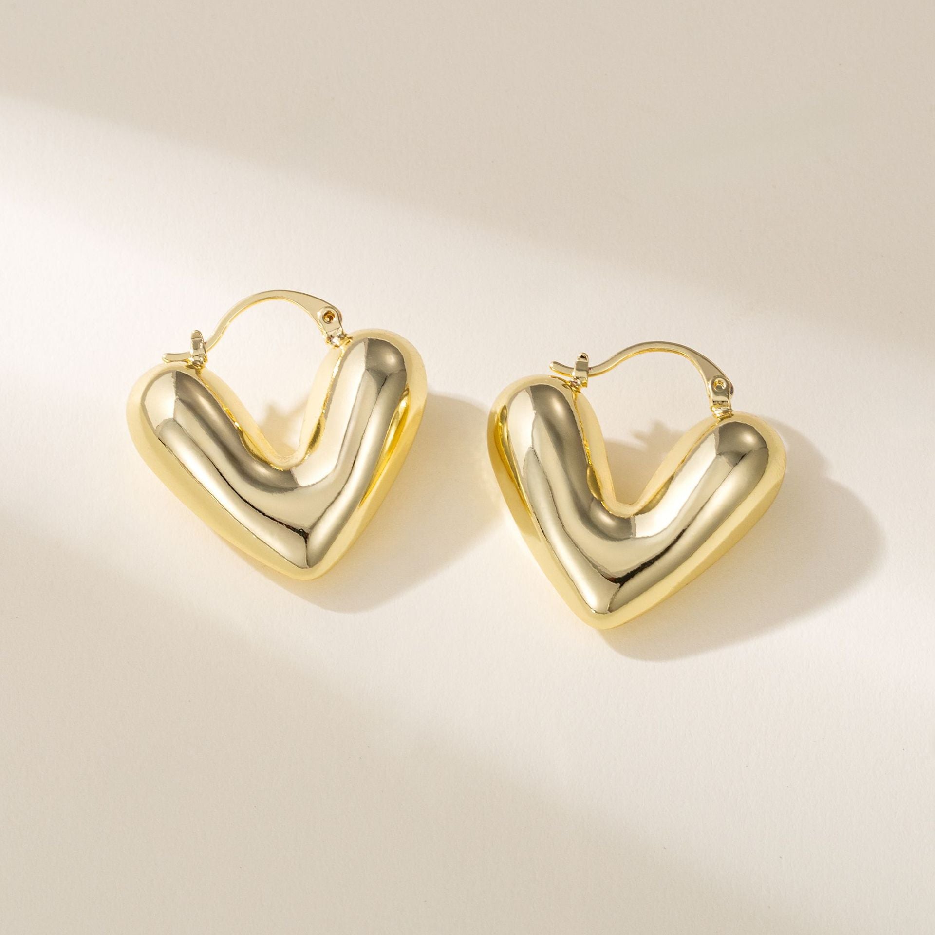Wholesale copper plated gold inlaid zircon love earrings