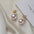 Wholesale silver needle front and back hanging pink and white shell pearl earrings
