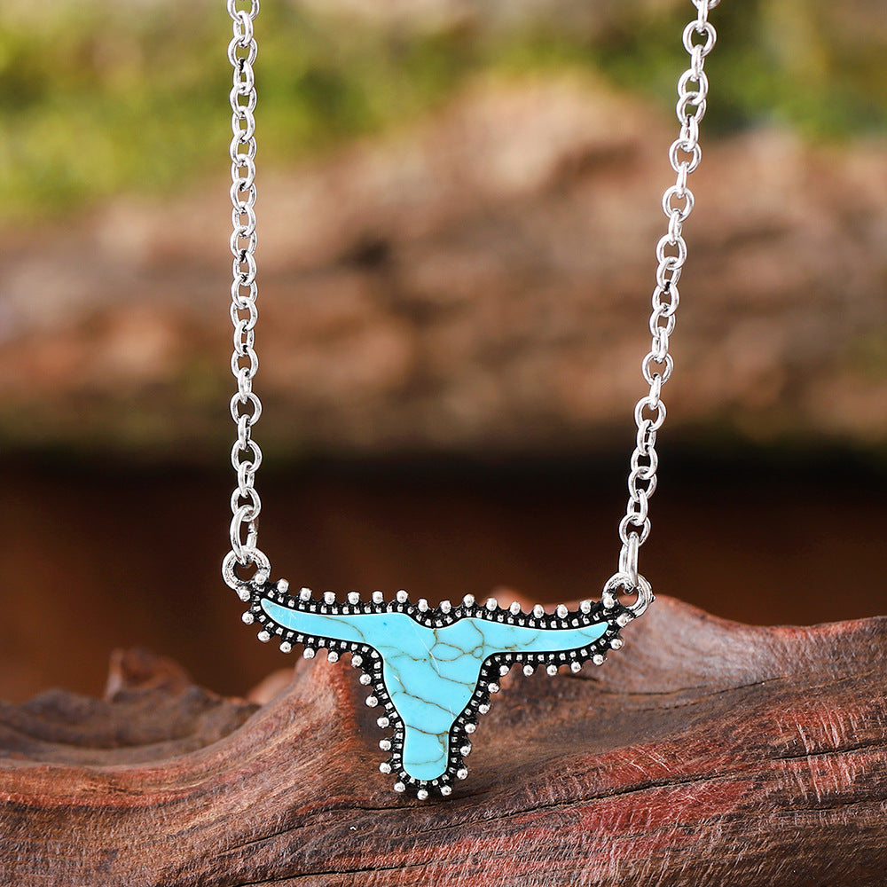 Wholesale Electroplated Zinc Alloy Retro Turquoise Cow Head Pendant Necklace