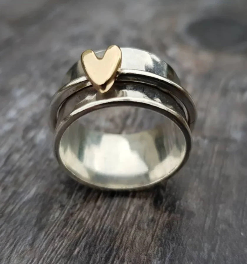 Wholesale two-color heart-shaped rotatable stress relief ring