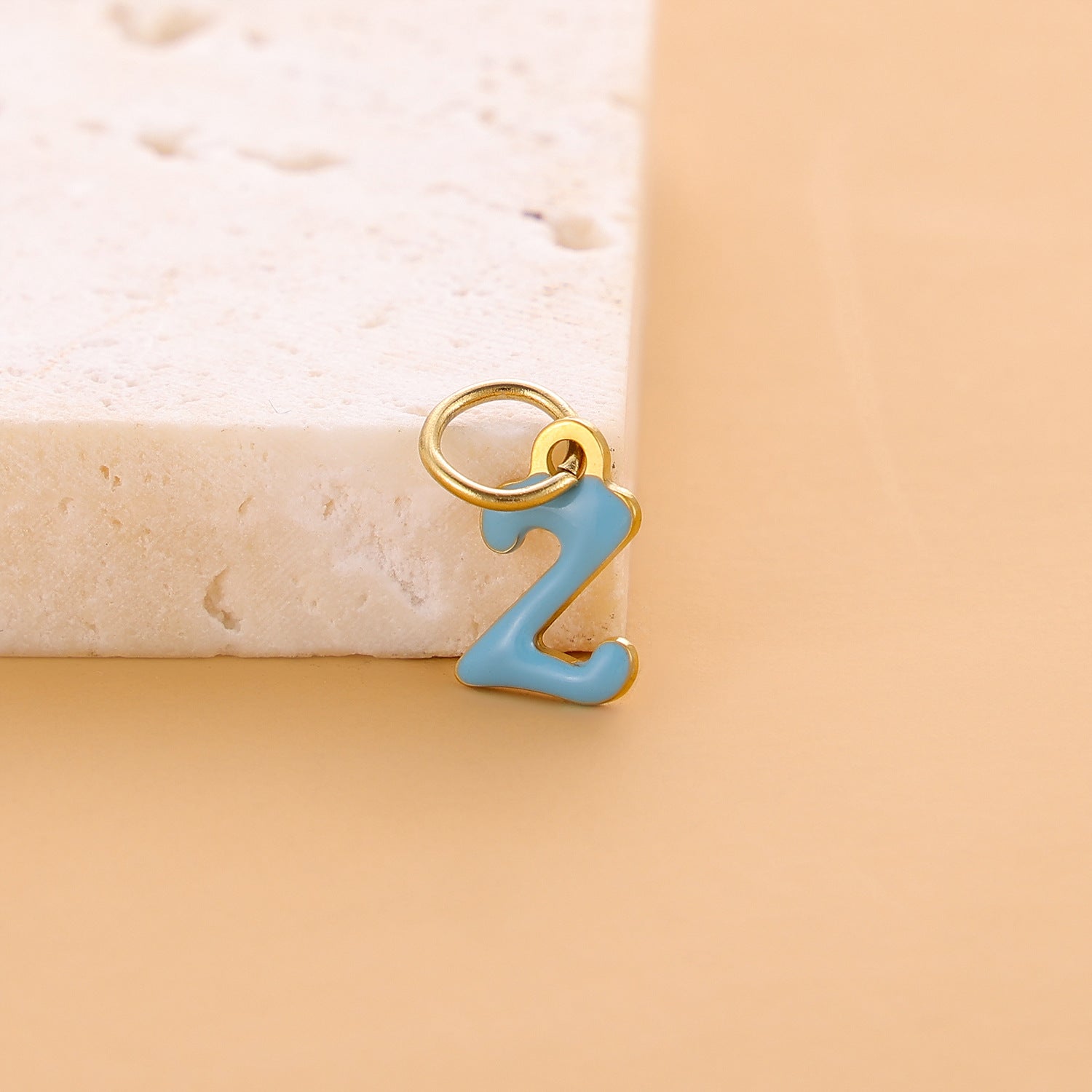 Wholesale Colorful 26 English letter pendant oil drop titanium steel vacuum plating pendant