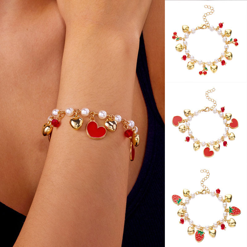 Wholesale Trendy Sweet Pearl Bracelet With Crystal Cherry Strawberry And Heart Charms Adjustable Fashion Jewelry Accessory For Women Boutique Resale And Gift