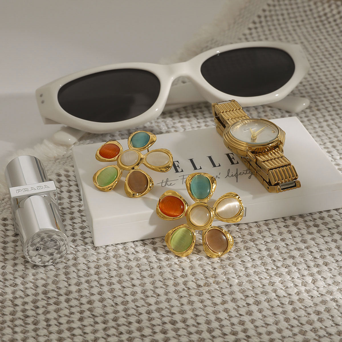 Wholesale stainless steel  light luxury cat's eye stone earrings