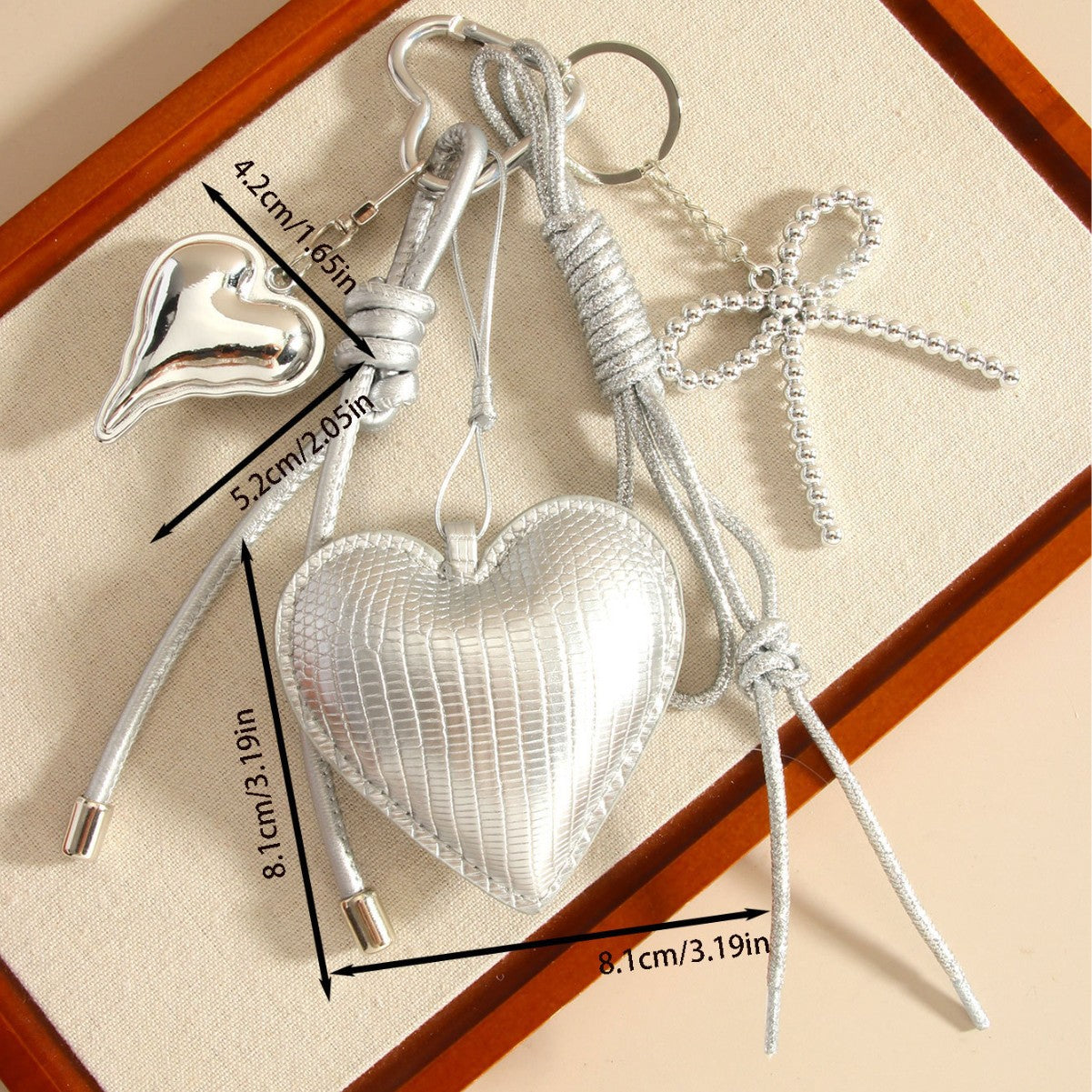Wholesale PU leather heart-shaped bowknot woven rope bag keychain