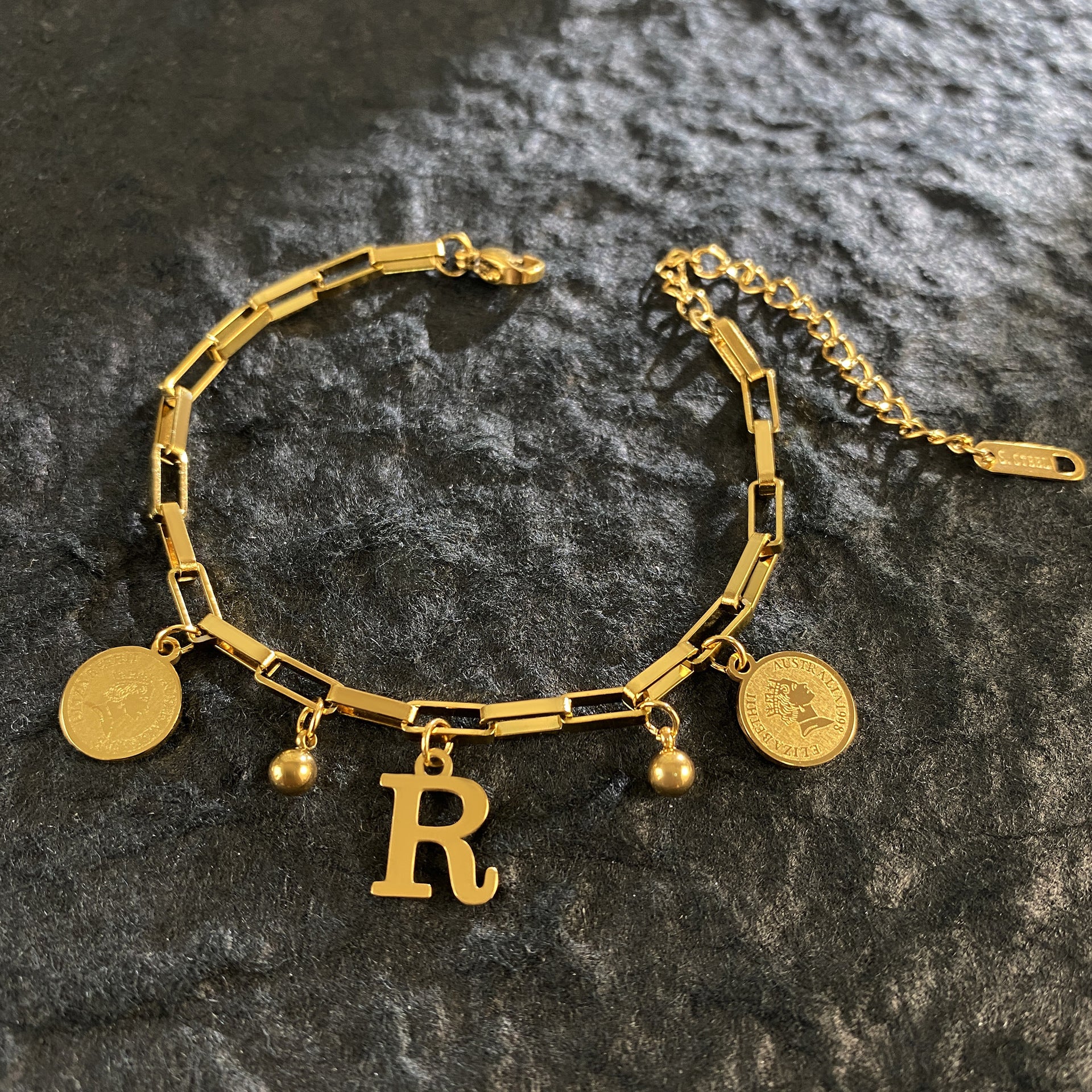 Wholesale Titanium Steel 18K Gold Plated Queen's Head Letter Bracelet ACC-BT-YuXun007