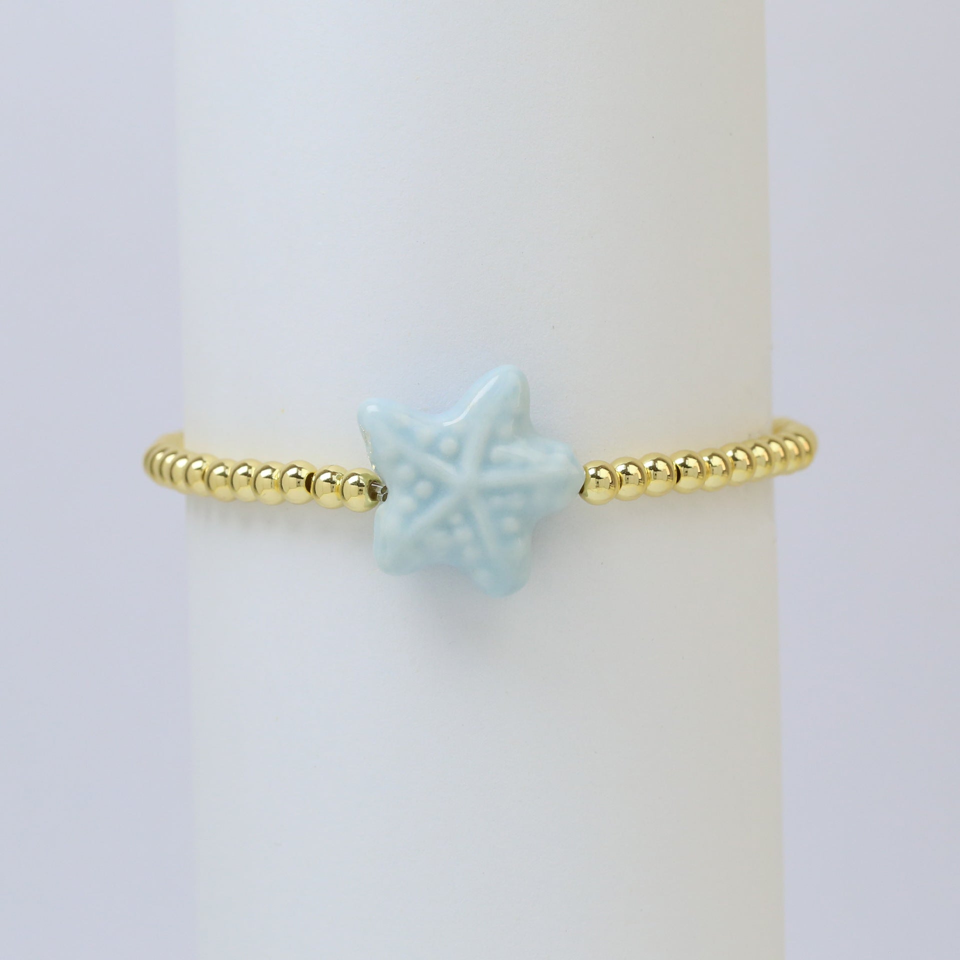 Wholesale Ceramic colored glass starfish elastic rope copper bead bracelet