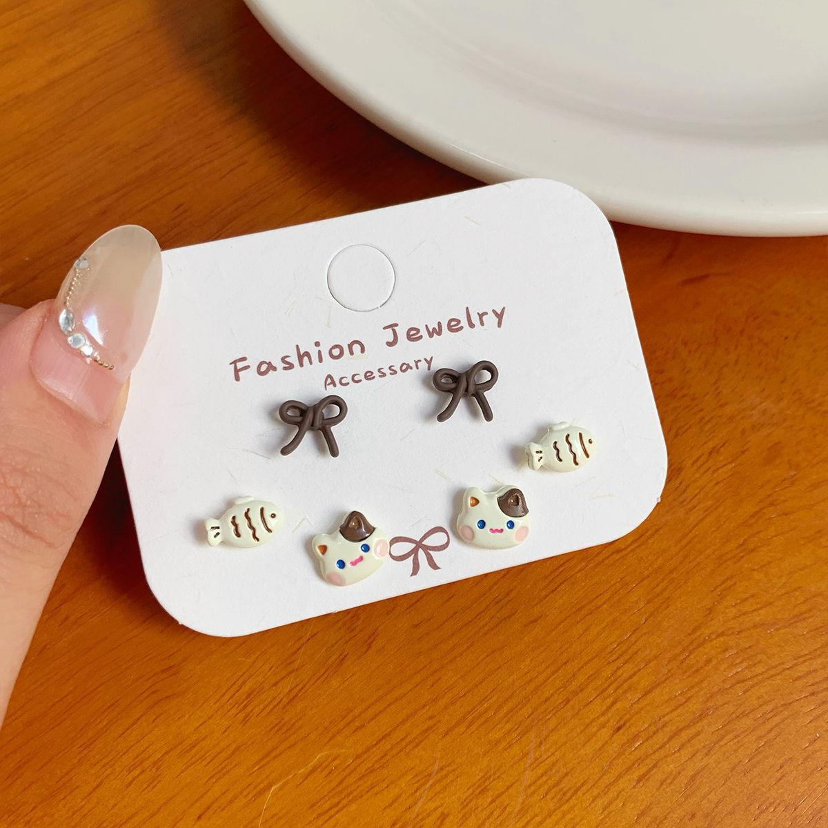 Wholesale Autumn cat geometric bean earrings set silver needle simple small flower bow earrings