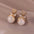 Wholesale S925 silver needle mermaid heart pearl earrings