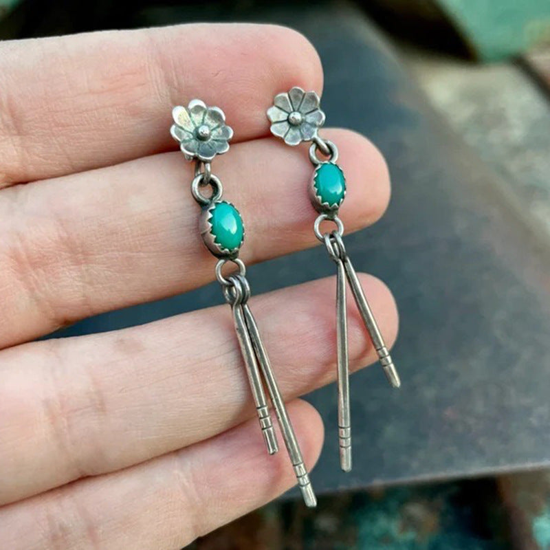 Wholesale Bohemian style carved pine stone long earrings