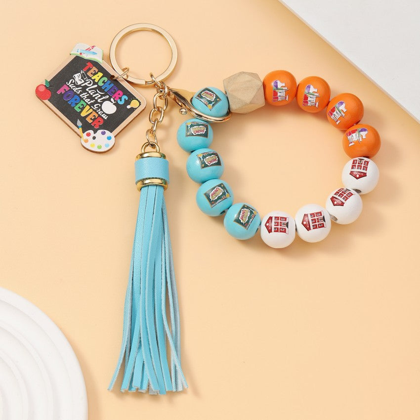 Wholesale Acrylic Fresh Color Tassel Apple Wood Brand Beaded Bracelet Keychains Wristlet Keychain ACC-KC-RongR069