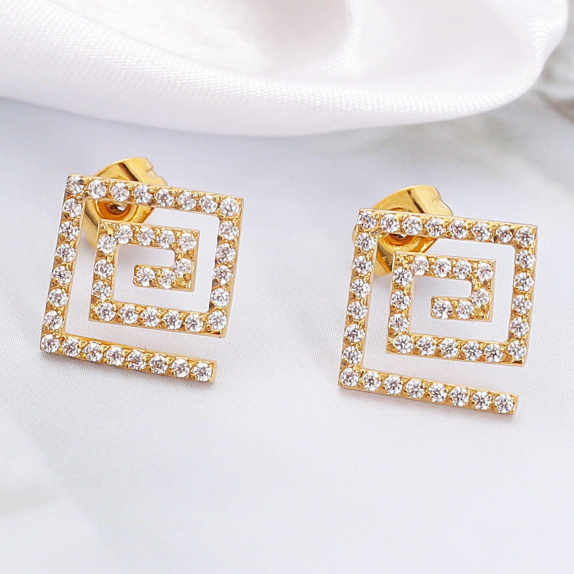 Wholesale Stainless steel earrings with zircon settings