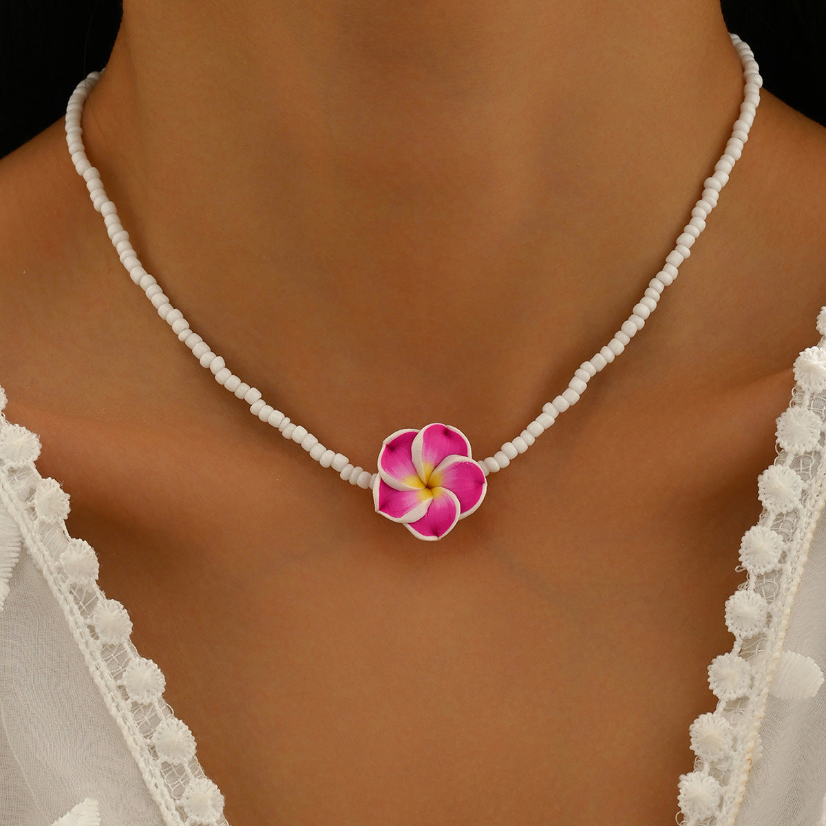 Wholesale Bohemian holiday style cute frangipani soft clay flower rice bead necklace