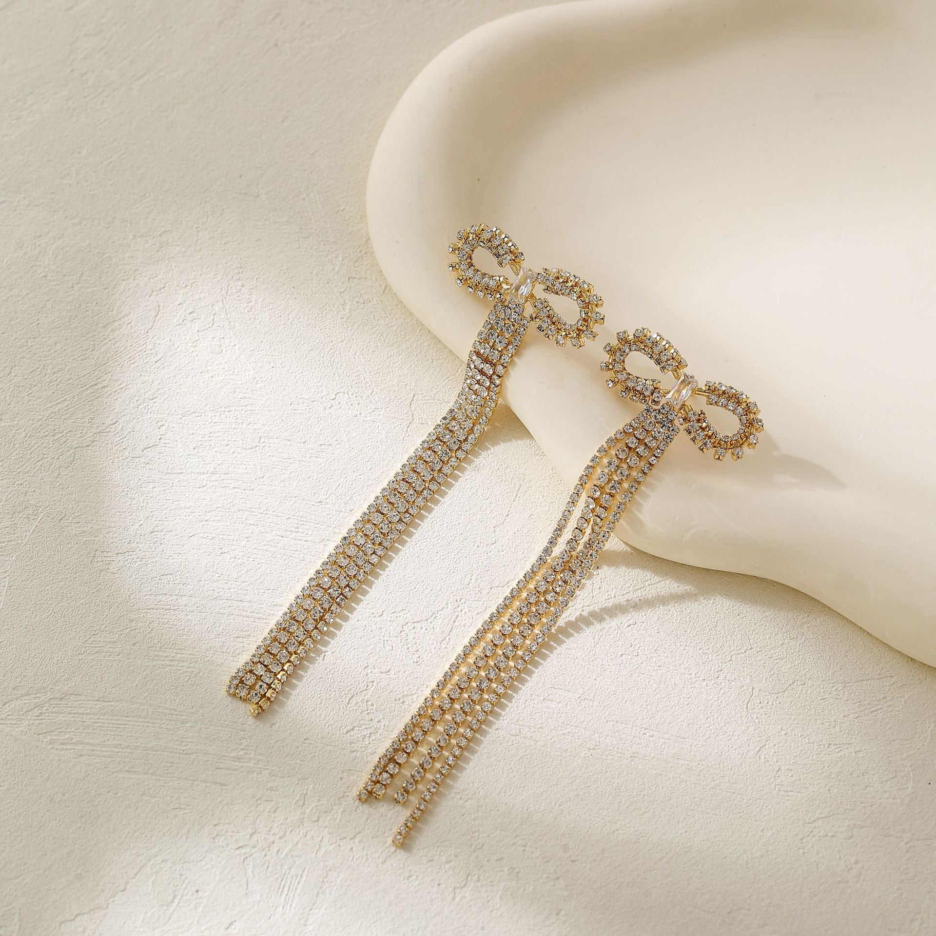 Wholesale Metal Bow Tassel Earrings