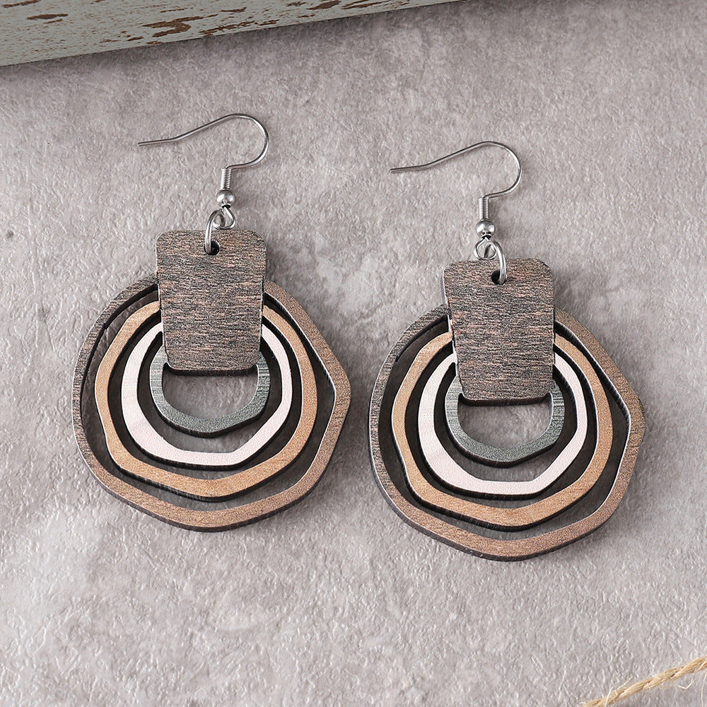 Wholesale Bohemian style three-dimensional leopard gradient hollow pendant earrings