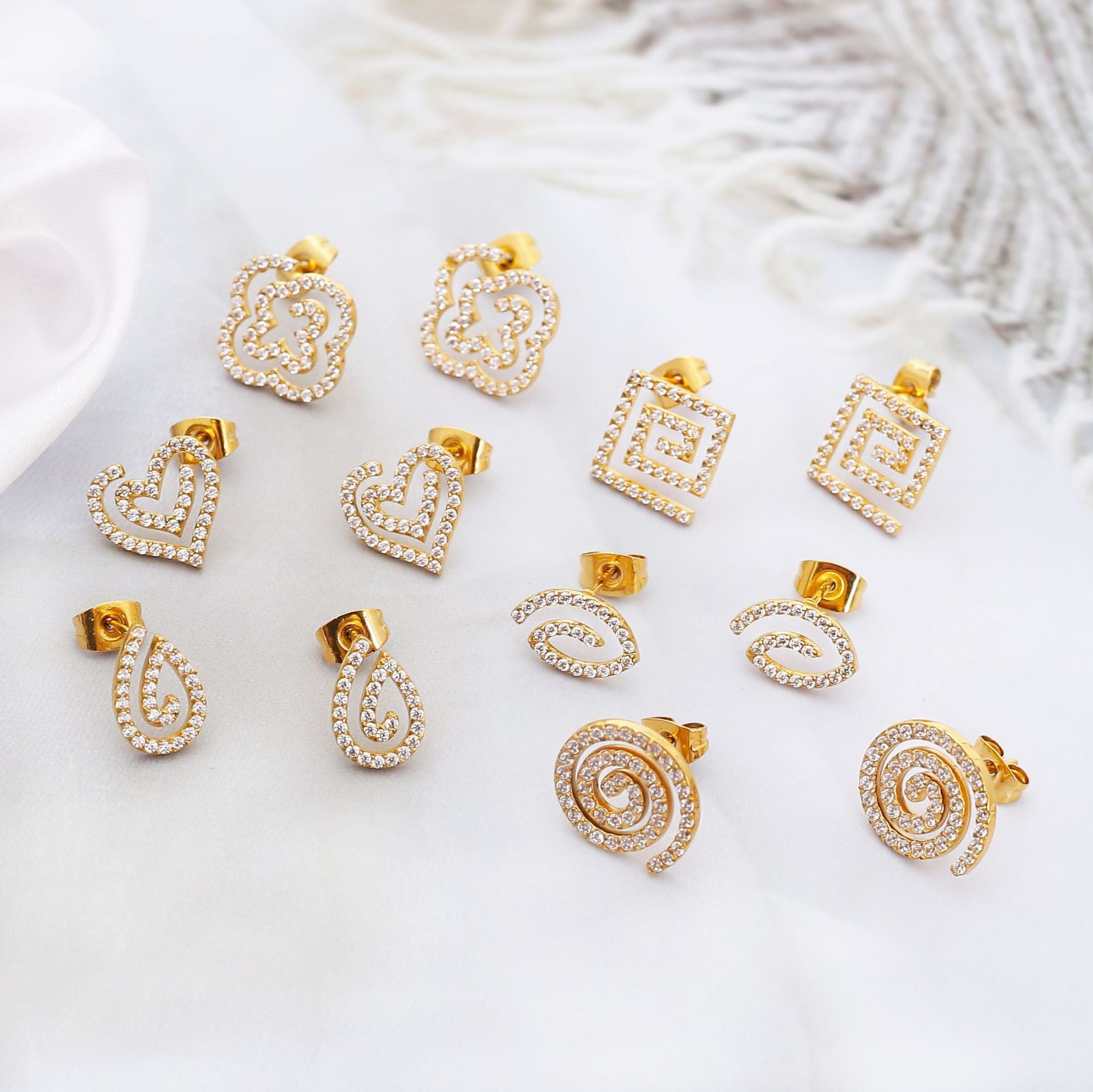 Wholesale Stainless steel earrings with zircon settings