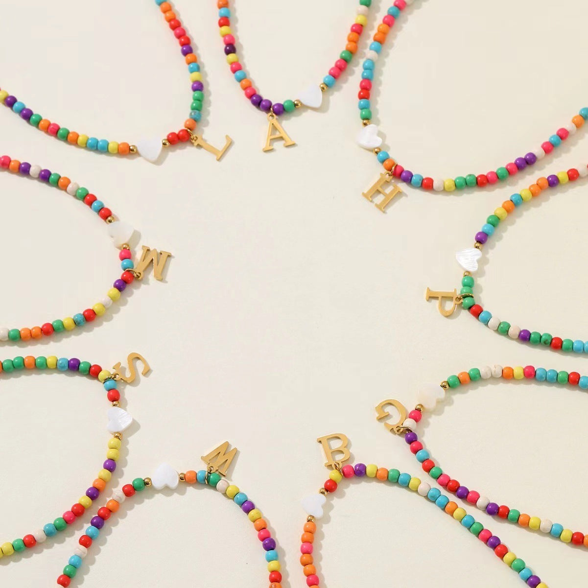 Wholesale stainless steel 26 English letters mixed color beads necklace