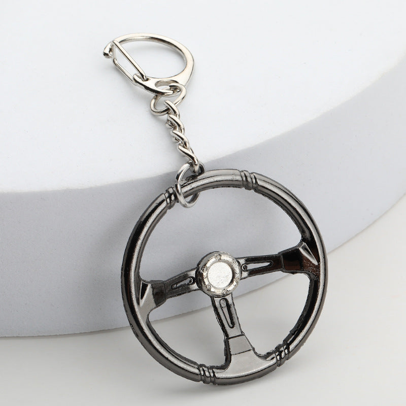 Wholesale racing steering wheel personalized modified car keychain