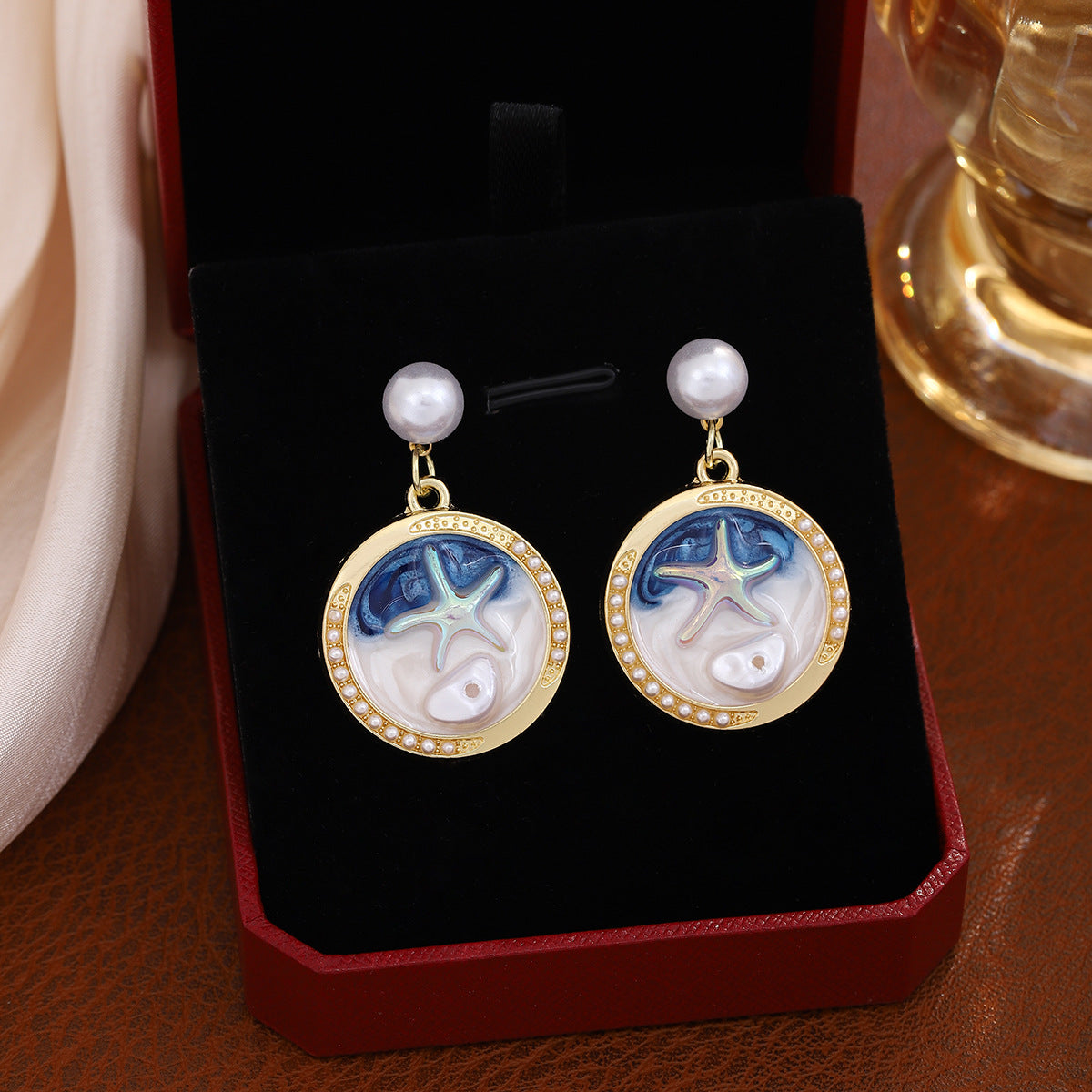 Wholesale Oil Dropping Three-dimensional Conch Pearl Flower Earrings