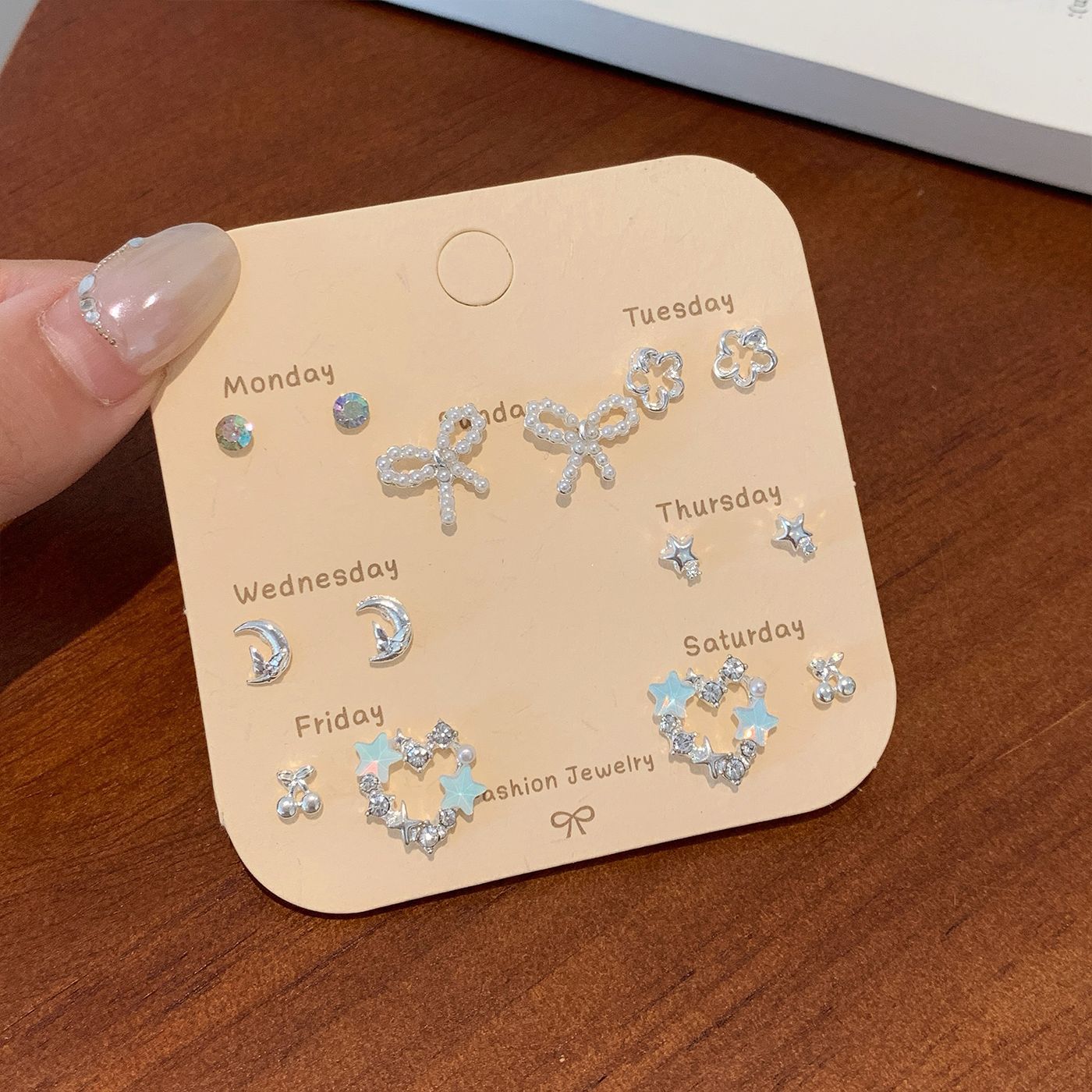 Wholesale Silver zircon butterfly flower star earring set