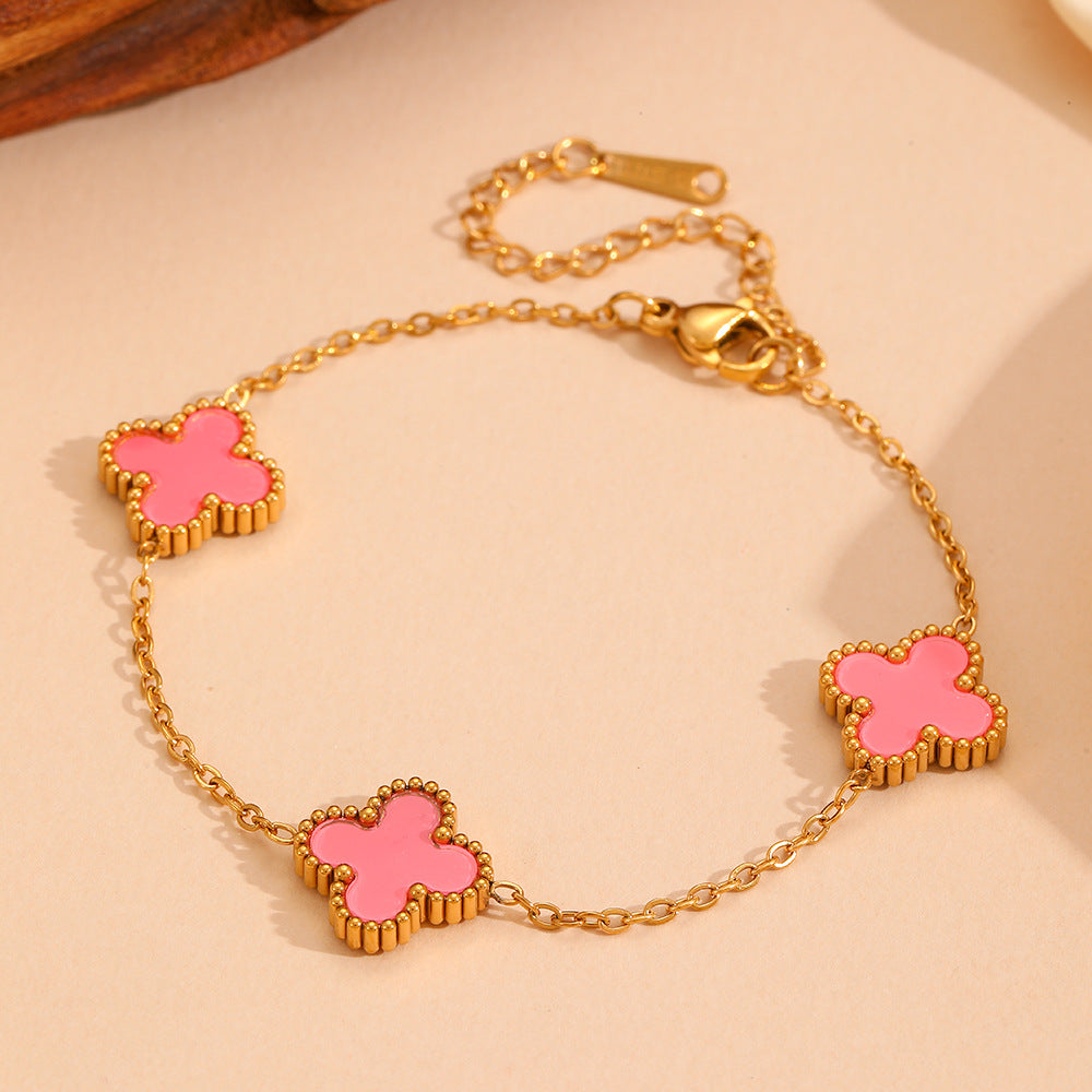 Wholesale Fashion stainless steel three four-leaf flower jewelry new titanium steel does not fade small flower jewelry suit