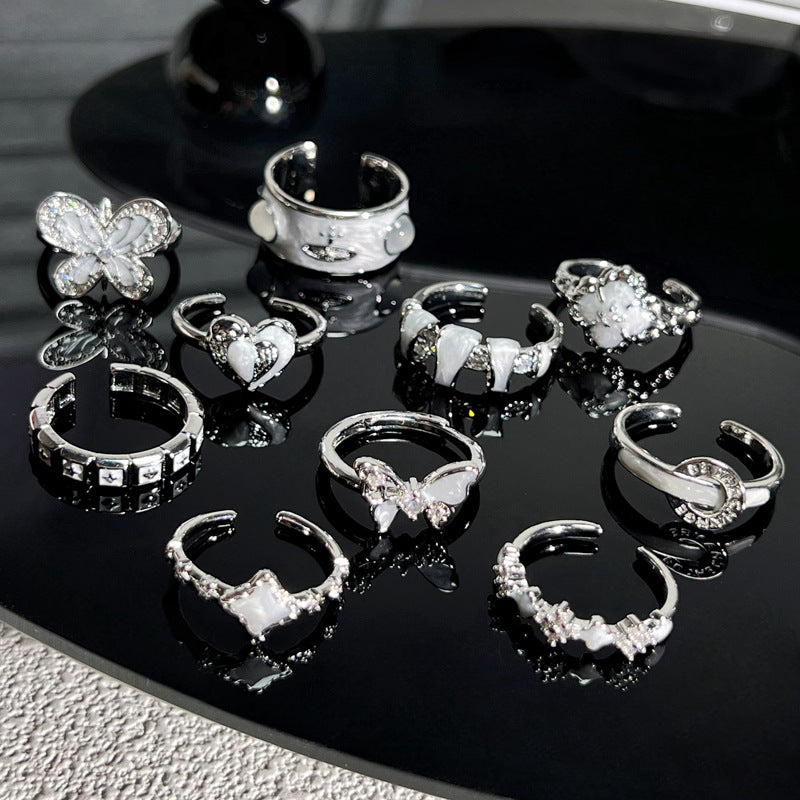 Wholesale White Drop Glaze Butterfly Saturn Fashion Ring