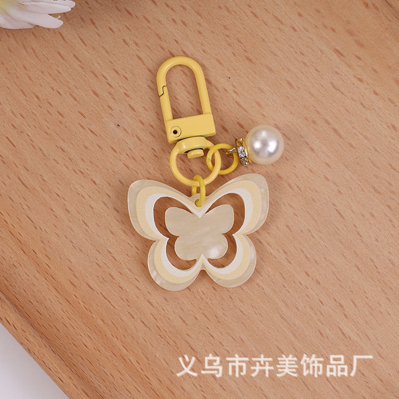 Wholesale Acrylic colorful hollow butterfly pearl pendant keychain