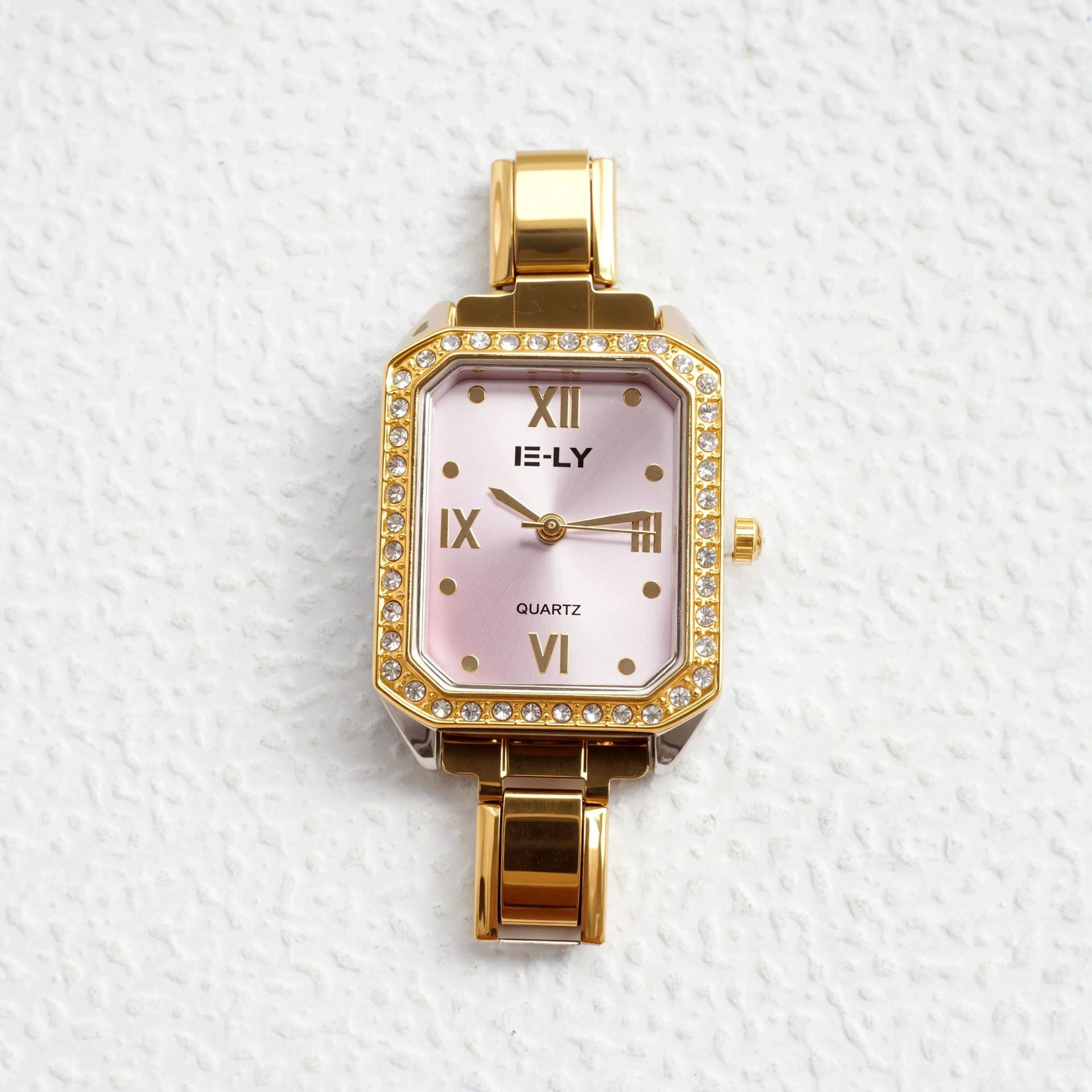Wholesale quartz gold-rimmed diamond-encrusted watch.