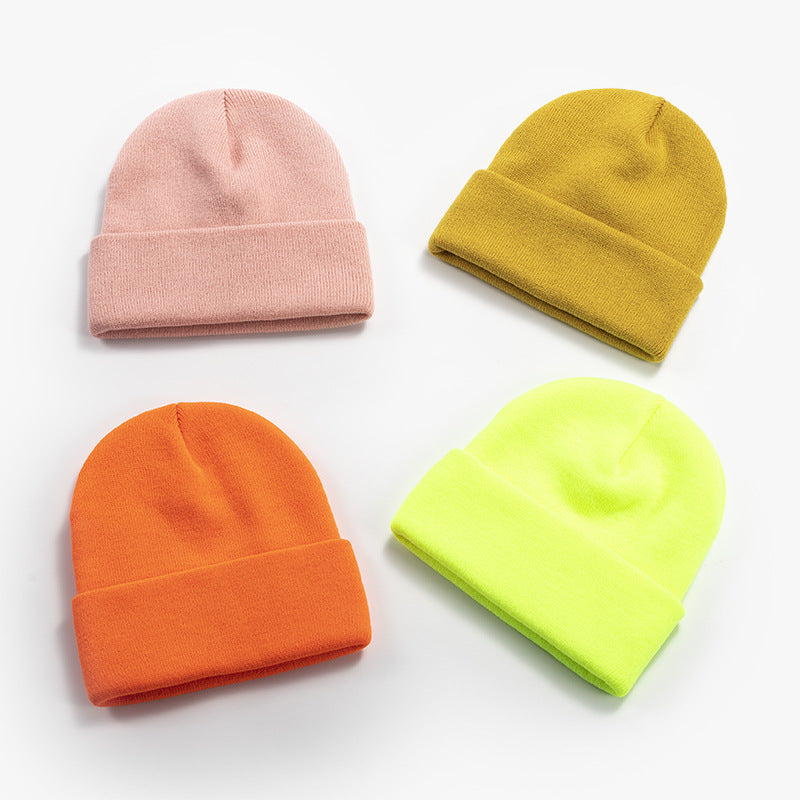 Wholesale light plate knitted cold cap acrylic solid color wool cap