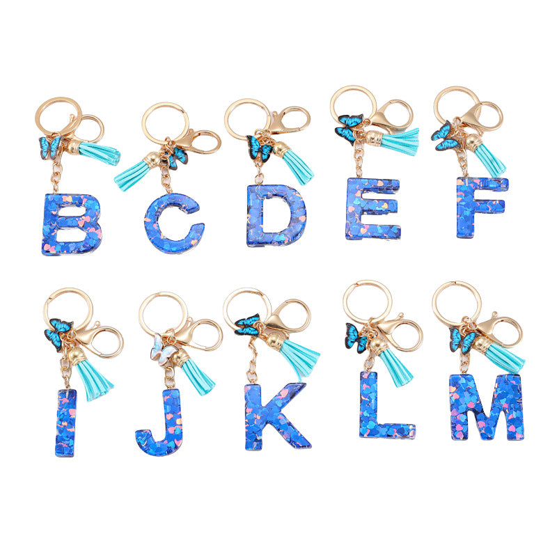 Wholesale Resin blue heart butterfly letter keychain