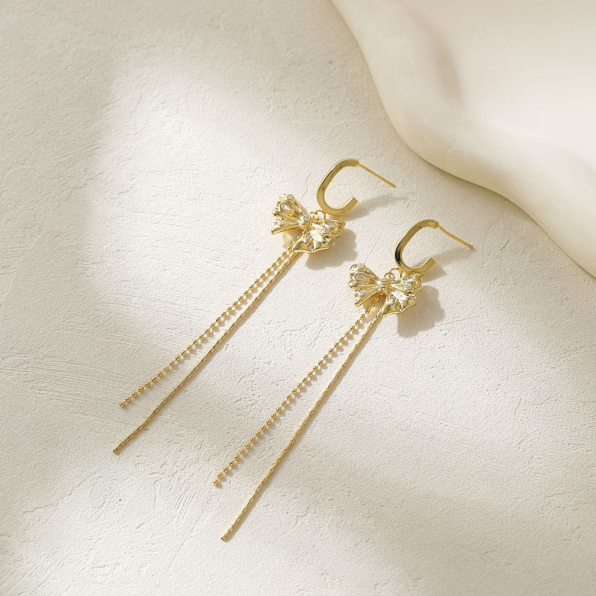 Wholesale Metal Bow Tassel Earrings