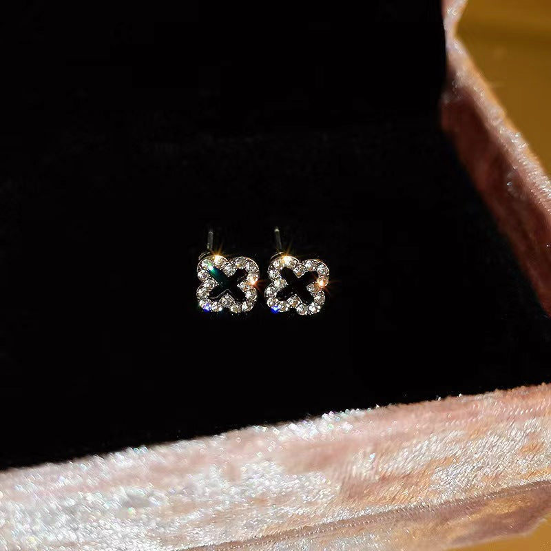 Wholesale silver needle diamond leaf hollow earrings