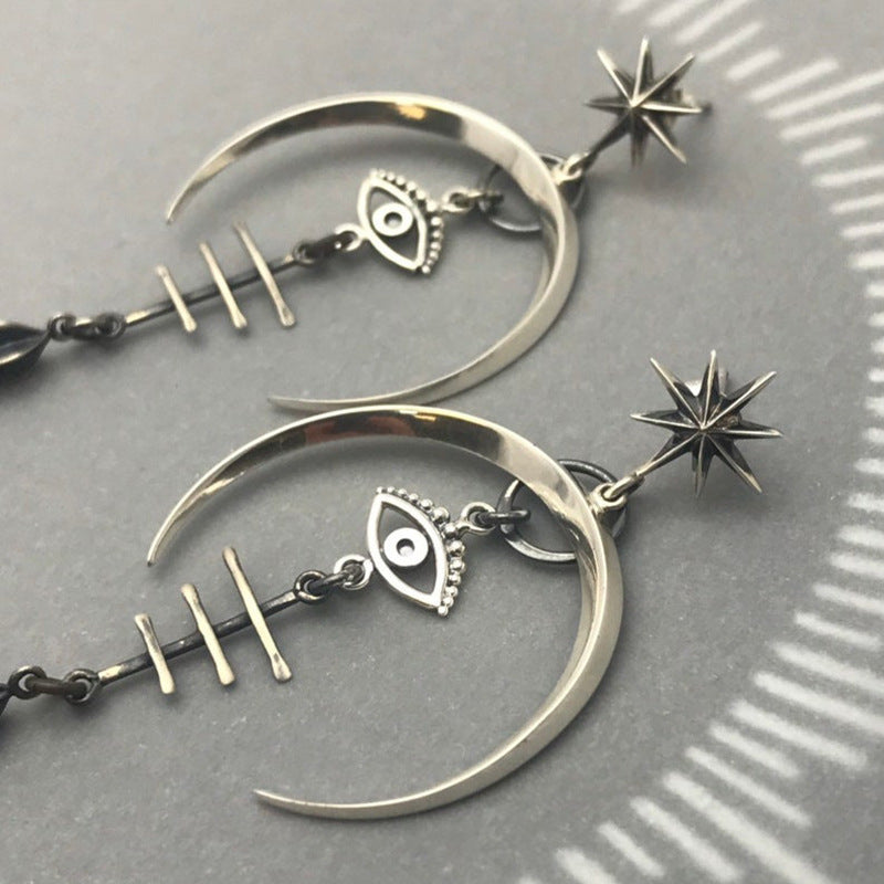 Wholesale Gothic Punk Devil' s Eye Handmade Metal Long Earrings Jewelry Accessory