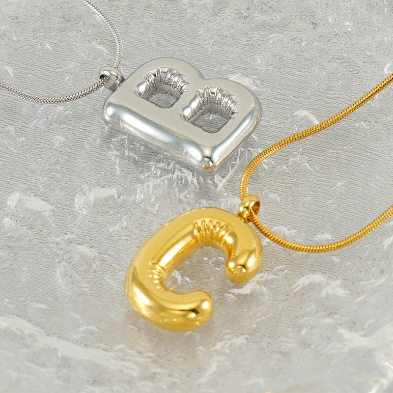 Großhandel Titanium Stahlblasenbuchstaben Halskette Schlangenknochenkette